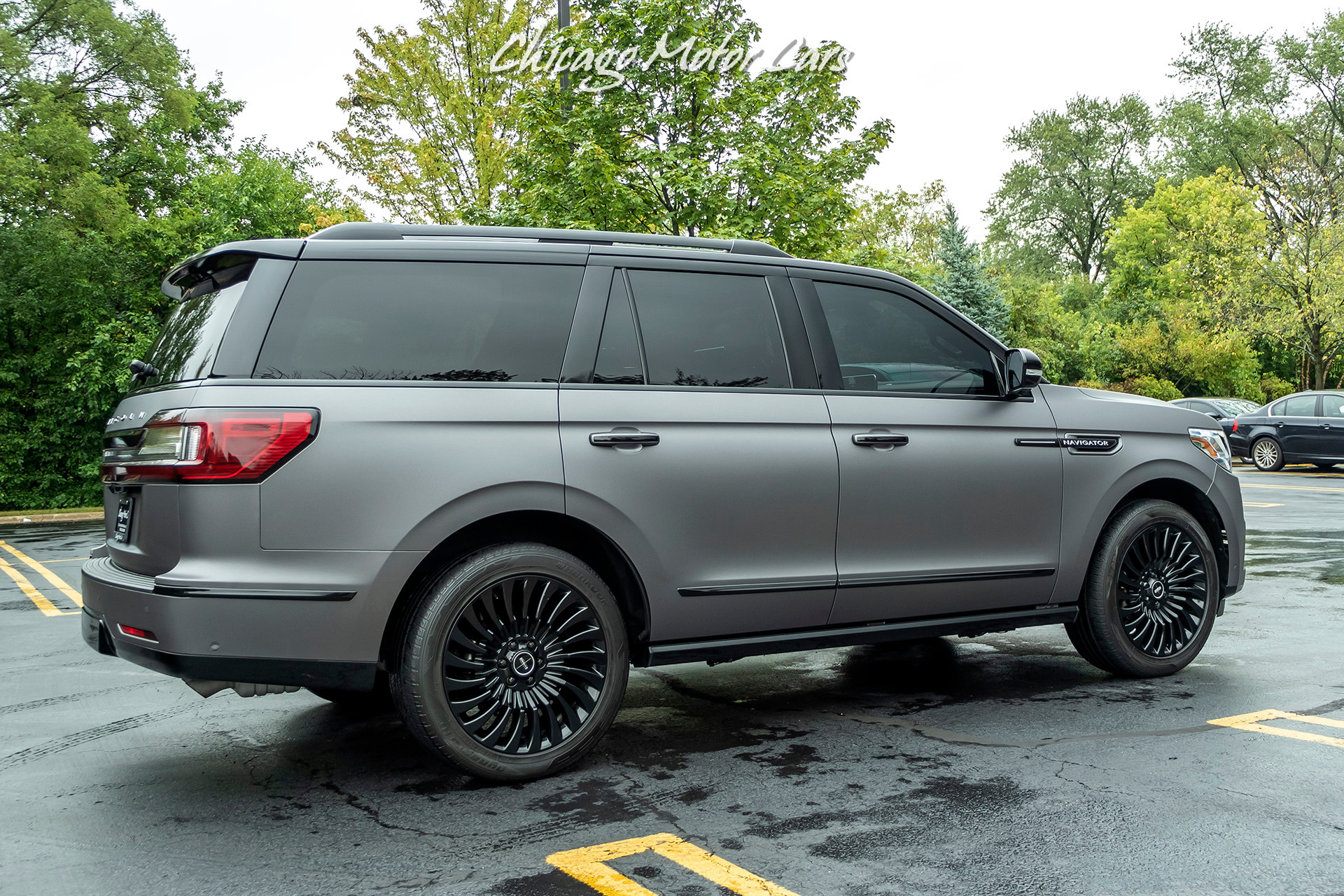 Lincoln Navigator Black Label Matte Black Wrap Rear Entertainment